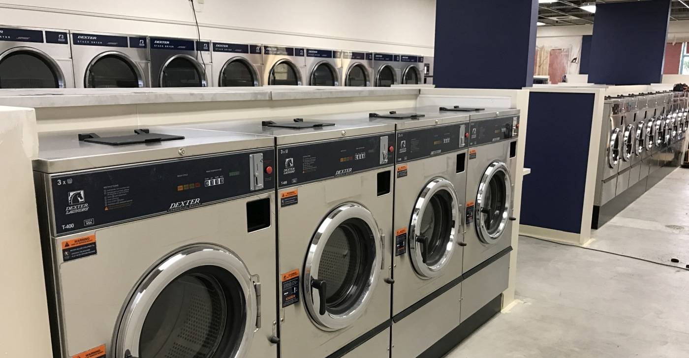 wide view of washers and dryers